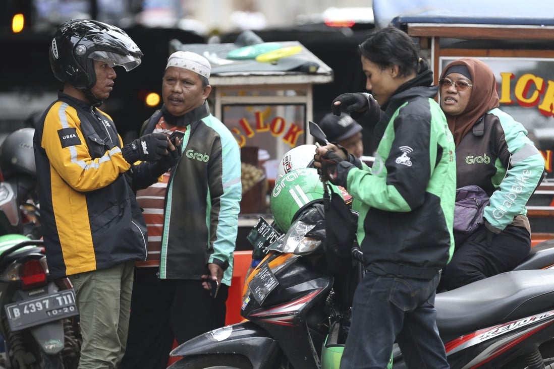 Indonesia is also working with Gojek and Grab to accelerate a safe and integrated transport system through a smart mobility program. Photo: AP