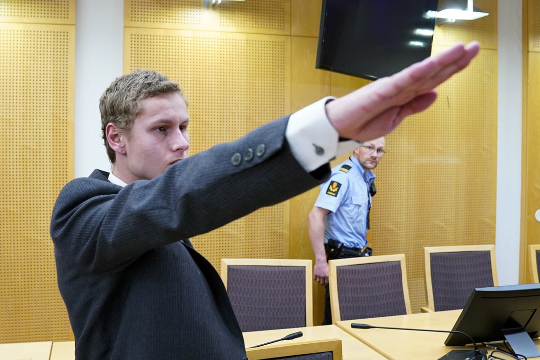 Norwegian suspect Philip Manshaus makes a Nazi salute as he appears at the Oslo District Court in August. Photo: EPA-EFE