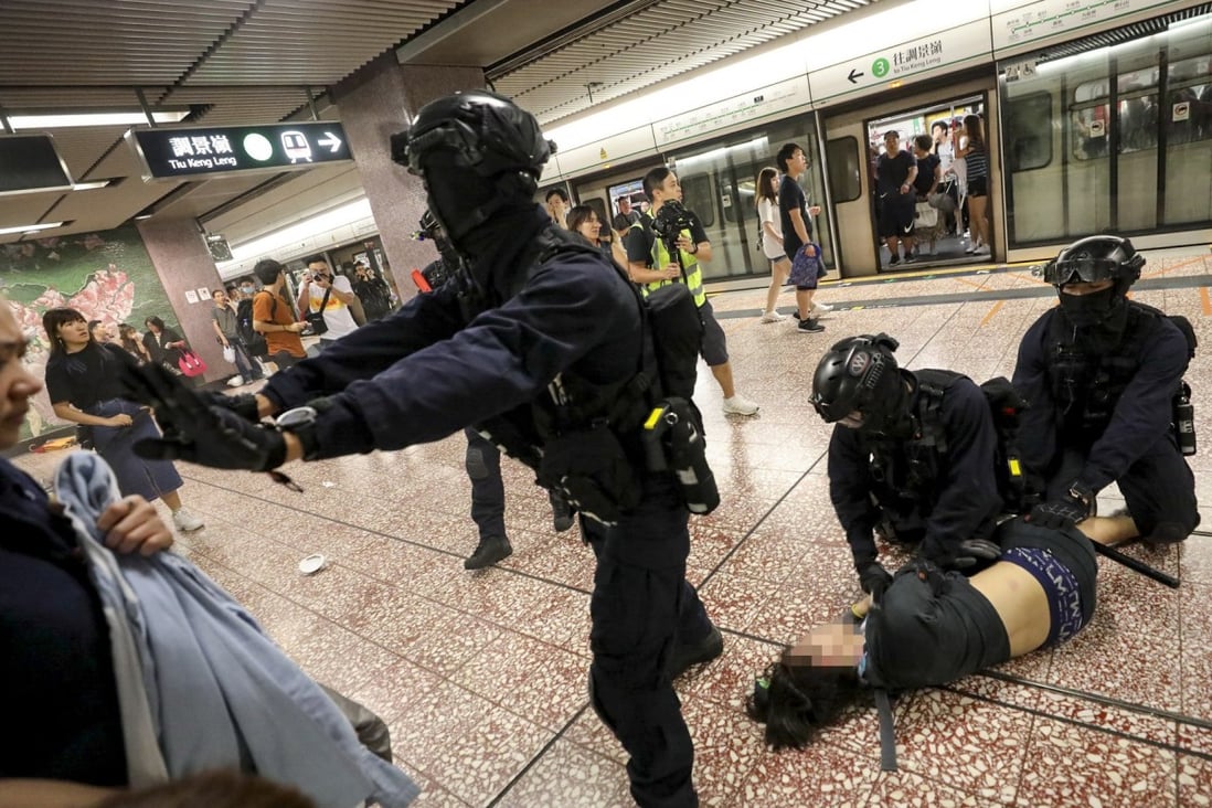 Riot police arrest an anti-government protester in Prince Edward MTR station on August 31. Photo: Handout
