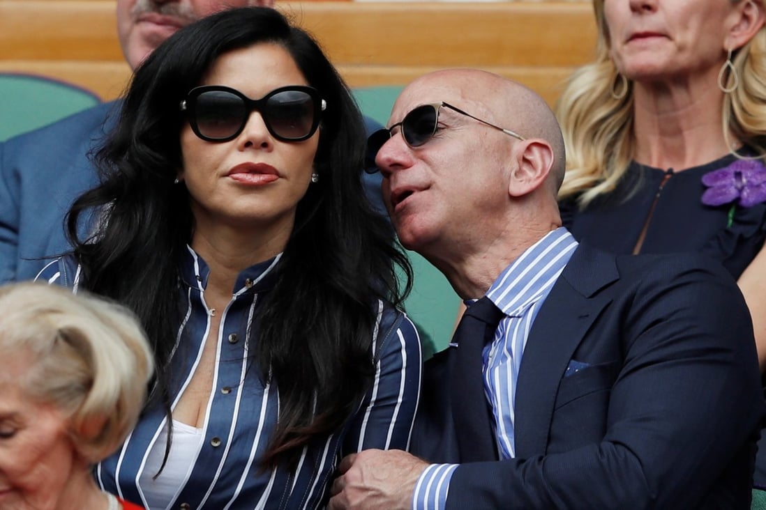 Jeff Bezos and Lauren Sanchez made their first public appearance following the billionaire’s divorce at the men's Wimbledon finals. Photo: Reuters
