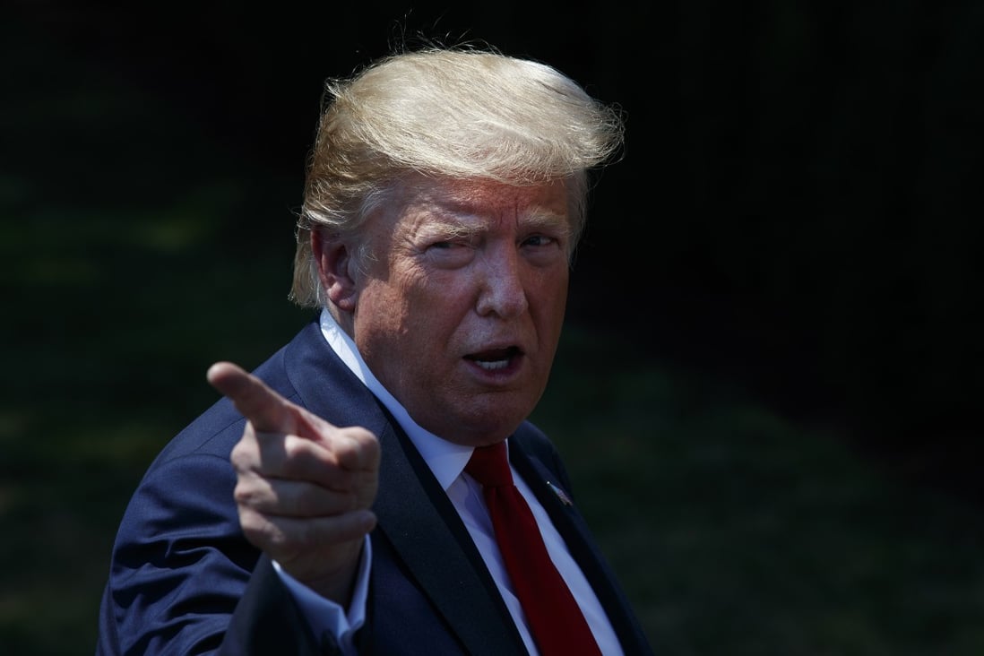 US President Donald Trump speaks to members of the media on the South Lawn of the White House in July. Photo: Bloomberg