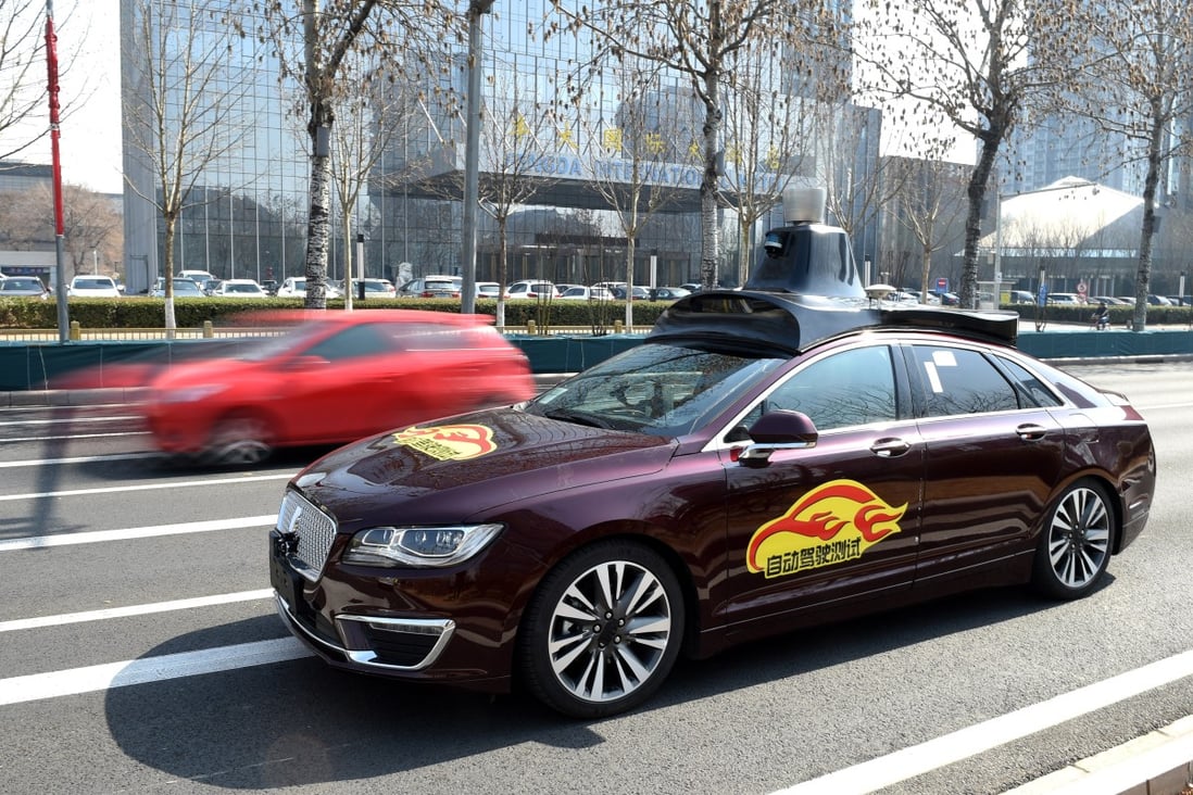 Baidu’s self-driving vehicle is seen on a public road test in Beijing on March 22, 2018 after the internet giant received its first temporary licence in the mainland’s capital. Baidu and two other companies have recently been granted licences to test autonomous vehicles in Wuhan, capital of central China’s Hubei province. Photo: Xinhua