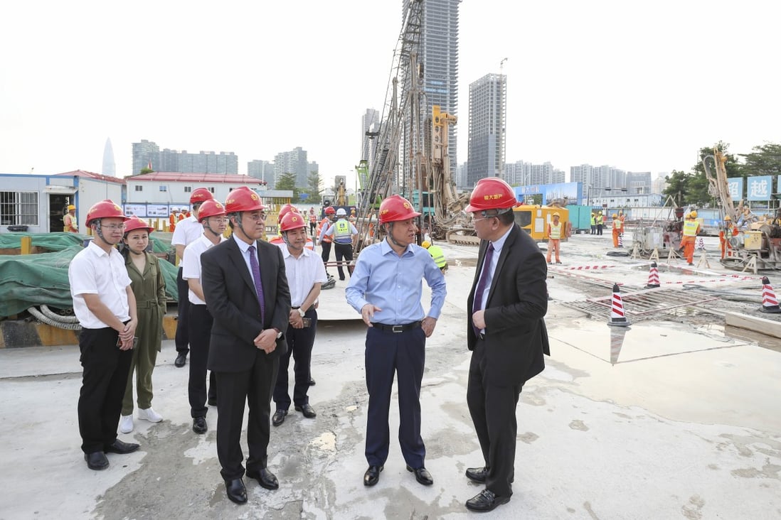 Xu Jiayin, second right, the billionaire chairman and founder of China Evergrande, during his visit to the construction site of the company’s new headquarters in Shenzhen’s Nanshan district. Photo: Handout