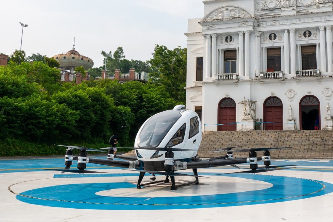 EHang’s two-seater, electric-powered autonomous flying taxi is parked at the Chinese drone maker’s test centre in Guangzhou. Photo: Chris Chang