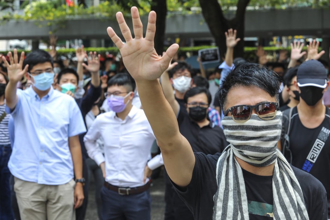 Protesters rally in Central against the new anti-mask law introduced by the Hong Kong government on Friday. Photo: Felix Wong