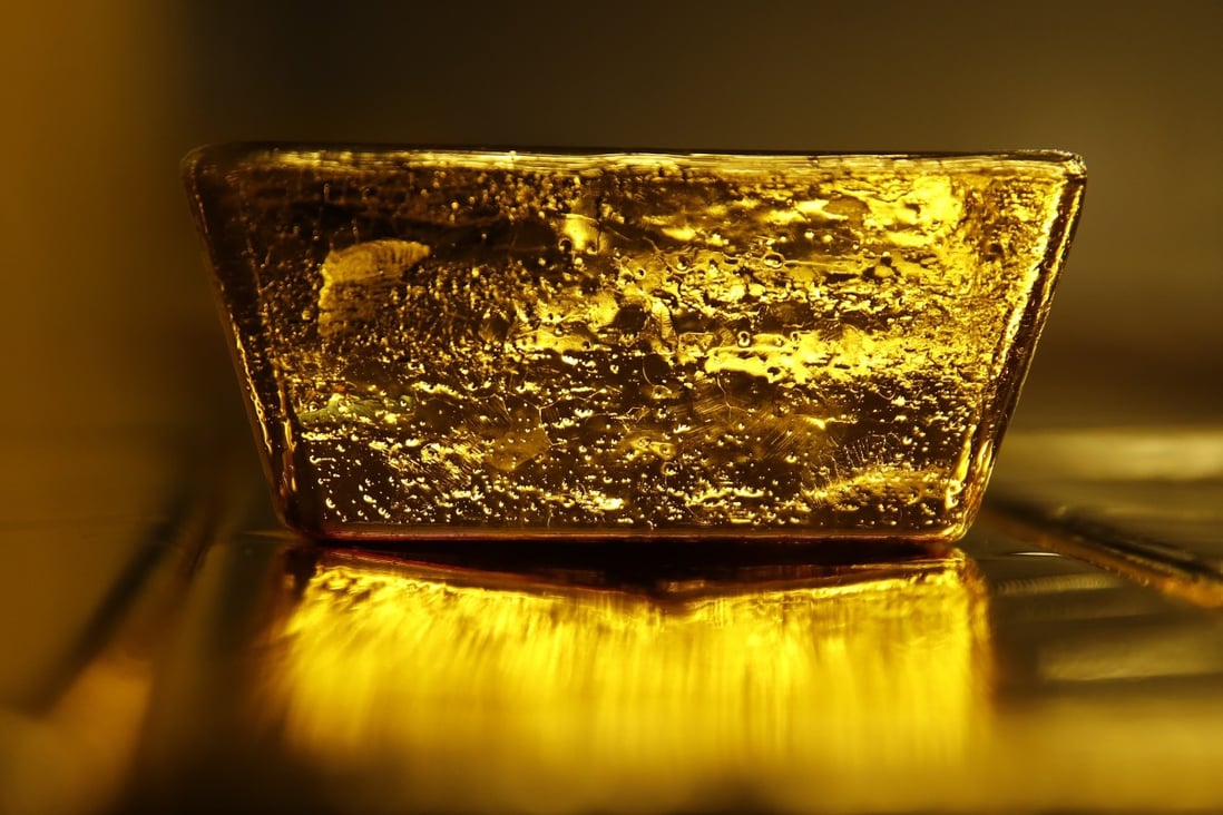 A gold bullion bar at a refinery in Switzerland. The price of the yellow metal has gained 23 per cent in the past 12 months as investors sought safety from global uncertainty. Photo: Bloomberg