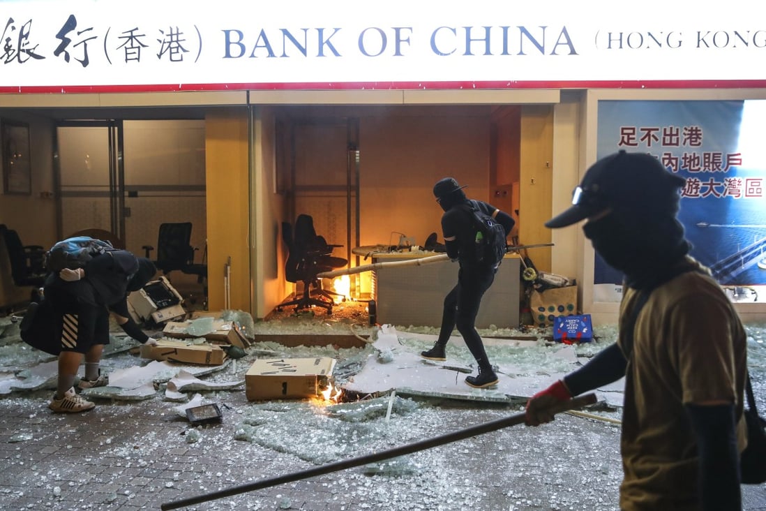 Protesters set a Bank of China branch on fire in Tsuen Wan. Photo: Winson Wong