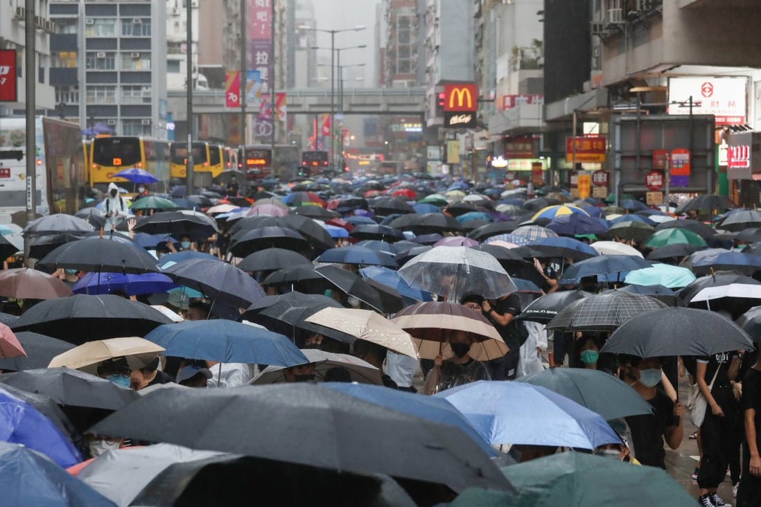 Anti-government protesters block Nathan Road in Mong Kok on Sunday. Photo: Jonathan Wong