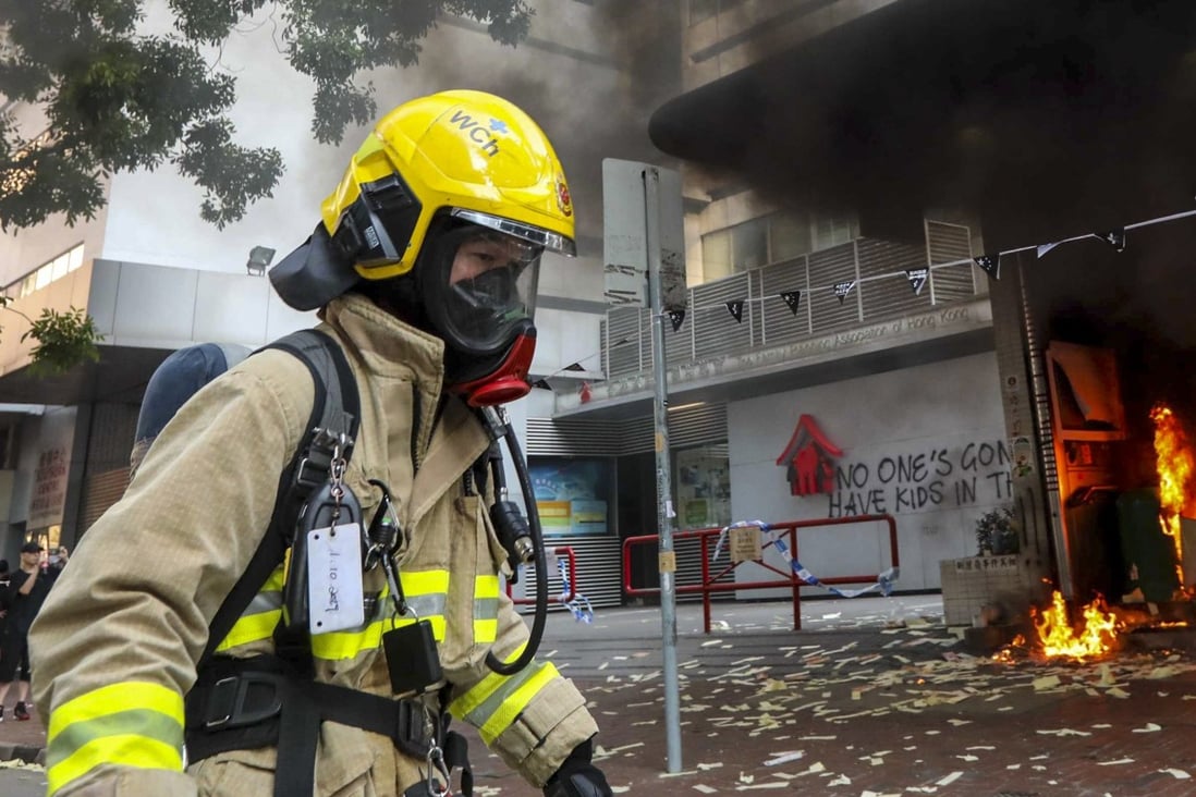 Hong Kong firefighters urged to ‘protect life’ as videos circulate of