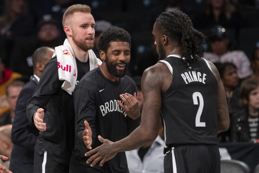 Brooklyn Nets’ players share a laugh during an exhibition game against at the Sesi/France club in Brazil over the weekend. Photo: AP