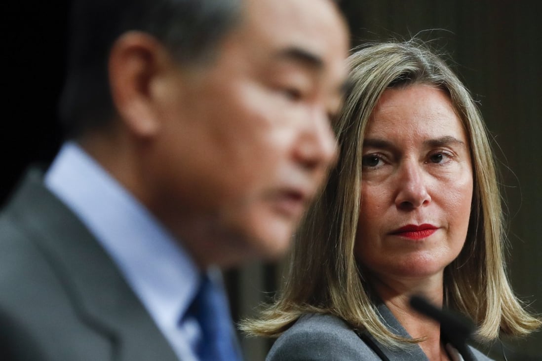 Chinese Foreign Minister Wang Yi speaks and European Union foreign policy chief Federica Mogherini looks on during a press conference following an EU-China high-level strategic dialogue in Brussels on March 18. Mogherini has recently expressed concern over how Beijing and Hong Kong authorities are handling the protests. Photo: EPA-EFE