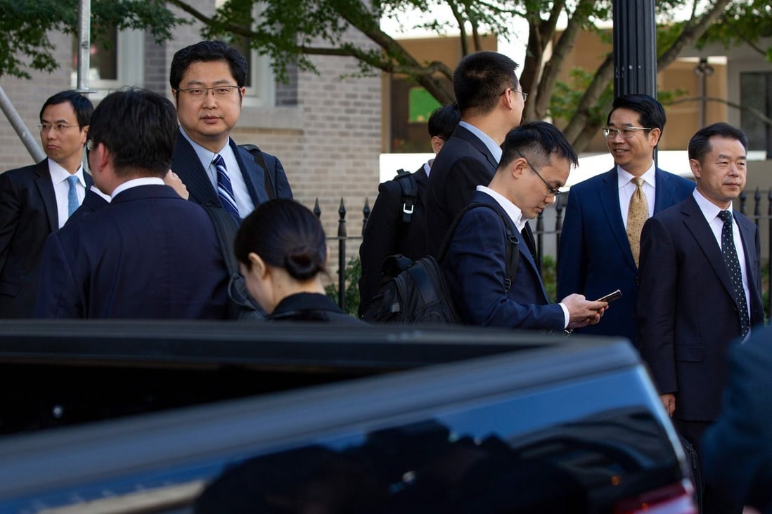 Members of the Chinese delegation wait to leave after deputy-level trade talks between China and the US in Washington on September 19. Photo: AFP