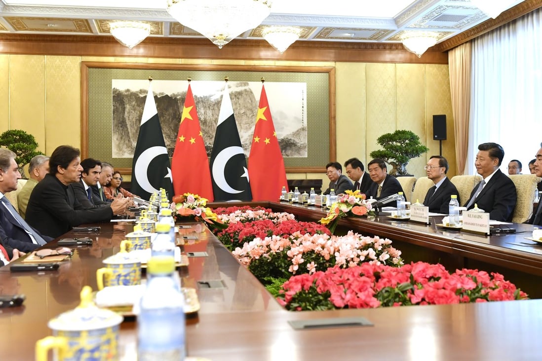 Pakistani Prime Minister Imran Khan (second from left) holds talks with Chinese President Xi Jinping (second from right) during their meeting at the Diaoyutai State Guesthouse in Beijing on Wednesday. Photo: EPA-EFE