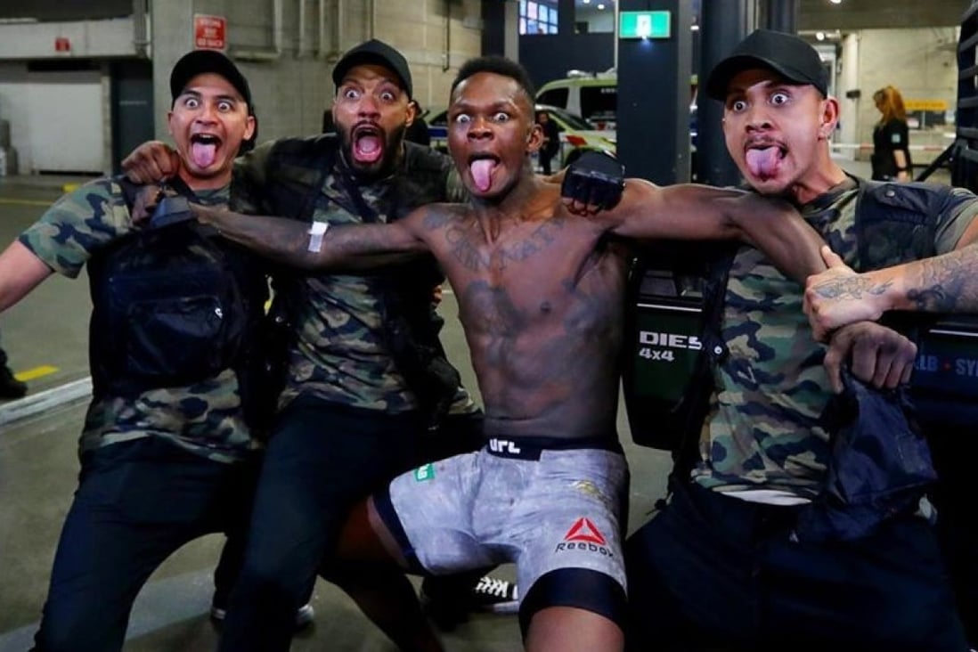 Israel Adesanya backstage with his friends after UFC 243. Photo: Twitter
