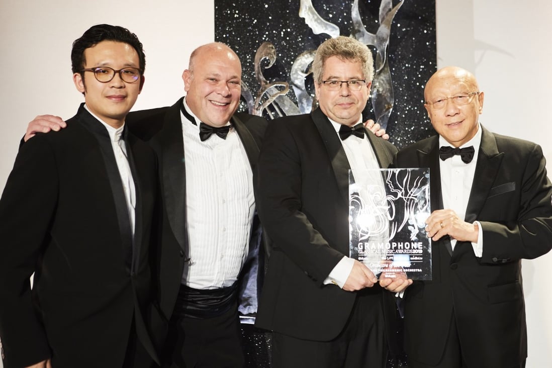 Hong Kong Philharmonic principal viola Andrew Ling (left), principal clarinet Andrew Simon (second from left), and chief executive Benedikt Fohr (second from right), and Y. S. Liu, chairman of the Board of Governors of the Hong Kong Philharmonic Society, receive the Orchestra of the Year Award at the 2019 Gramophone Classical Music Awards ceremony on behalf of the orchestra. Photo: Gem Rey/HK Phil