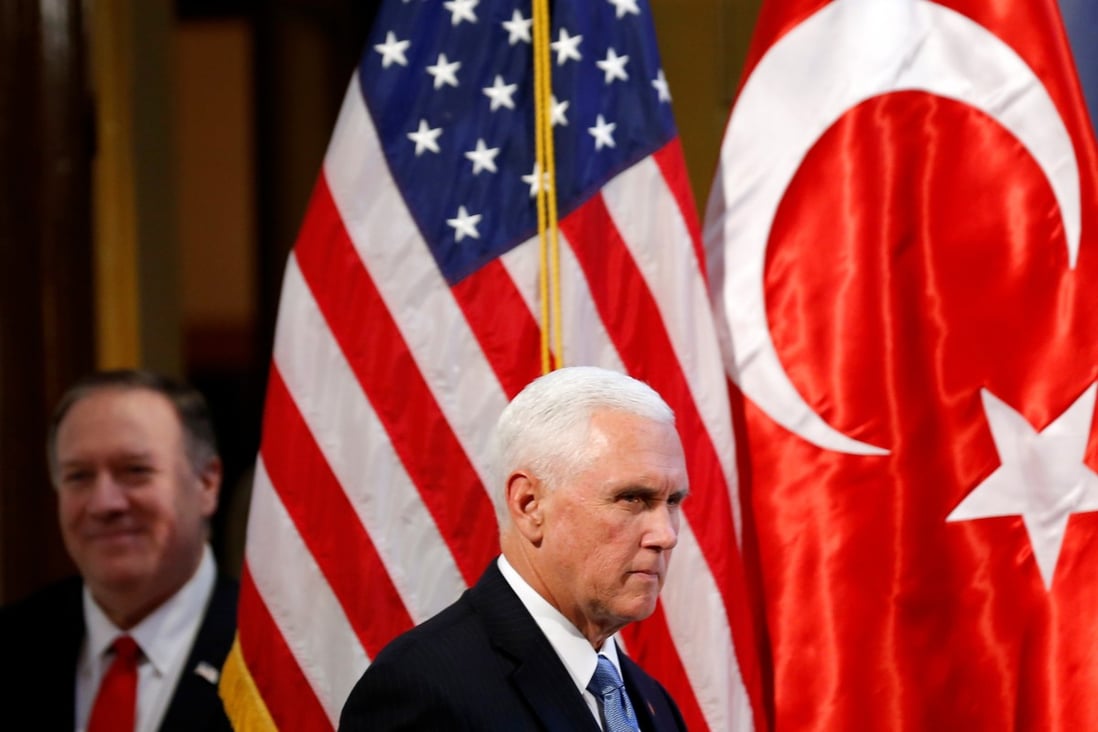 US Vice-President Mike Pence (right) and US Secretary of State Mike Pompeo arrive to address a news conference at the US embassy in Ankara, Turkey, on Thursday. Photo: Reuters