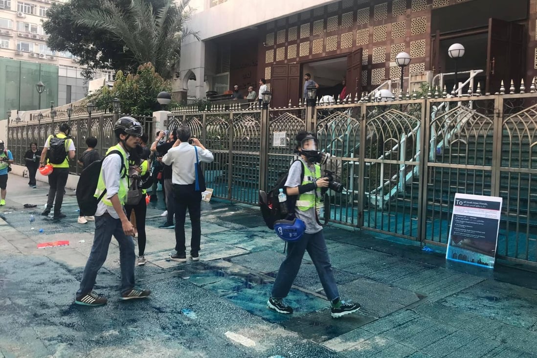 Member of the press are seen outside Kowloon Mosque on Nathan Road, shortly after it was hit by a police water cannon. Photo: Civic Party via Reuters