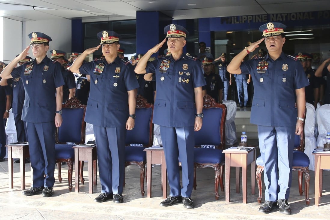 From left: The Philippine National Police’s Guillermo Eleazar, acting police chief Archie Gamboa, former chief Oscar Albayalde, and Camilo Cascolan. Photo: AP