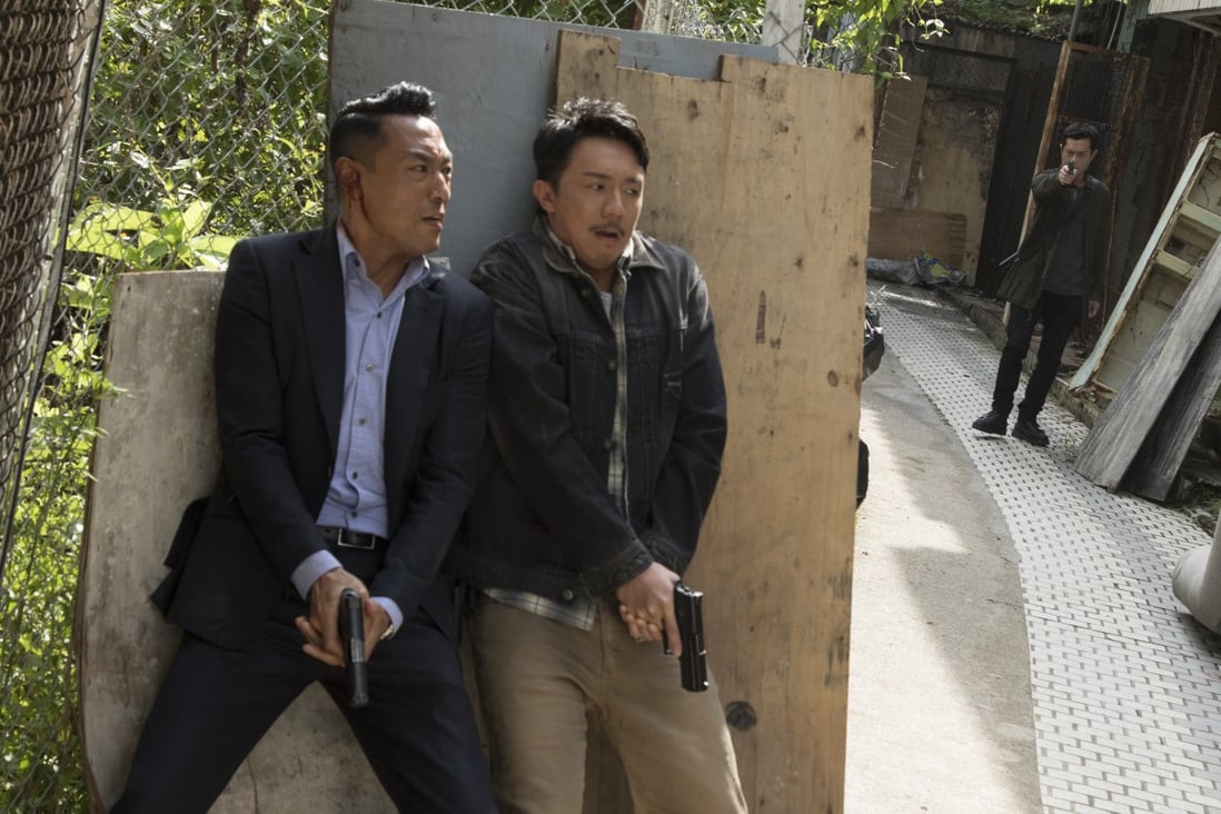Philip Keung (left) and Louis Cheung in a scene from A Witness out of the Blue (category: IIB; Cantonese), directed by Fung Chih-chiang and also starring Louis Koo.