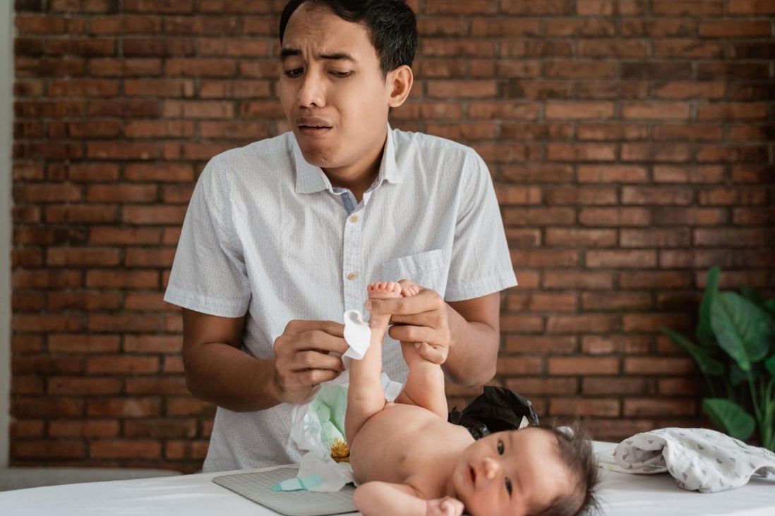 Learning to change a dirty diaper properly is essential for new dads. Photo: Alamy