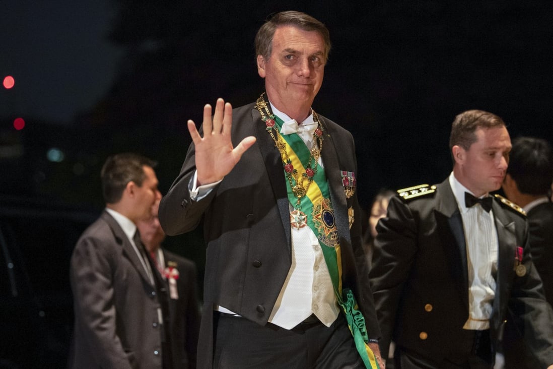 President Jair Bolsonaro pictured at a banquet at the Imperial Palace in Tokyo on Tuesday. He will start his visit to China on Thursday. Photo: Bloomberg