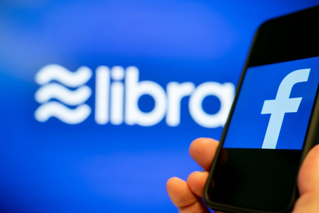 An illustration picture shows the logos of the Internet company Facebook (R) and the global digital currency Libra. Photo: DPA