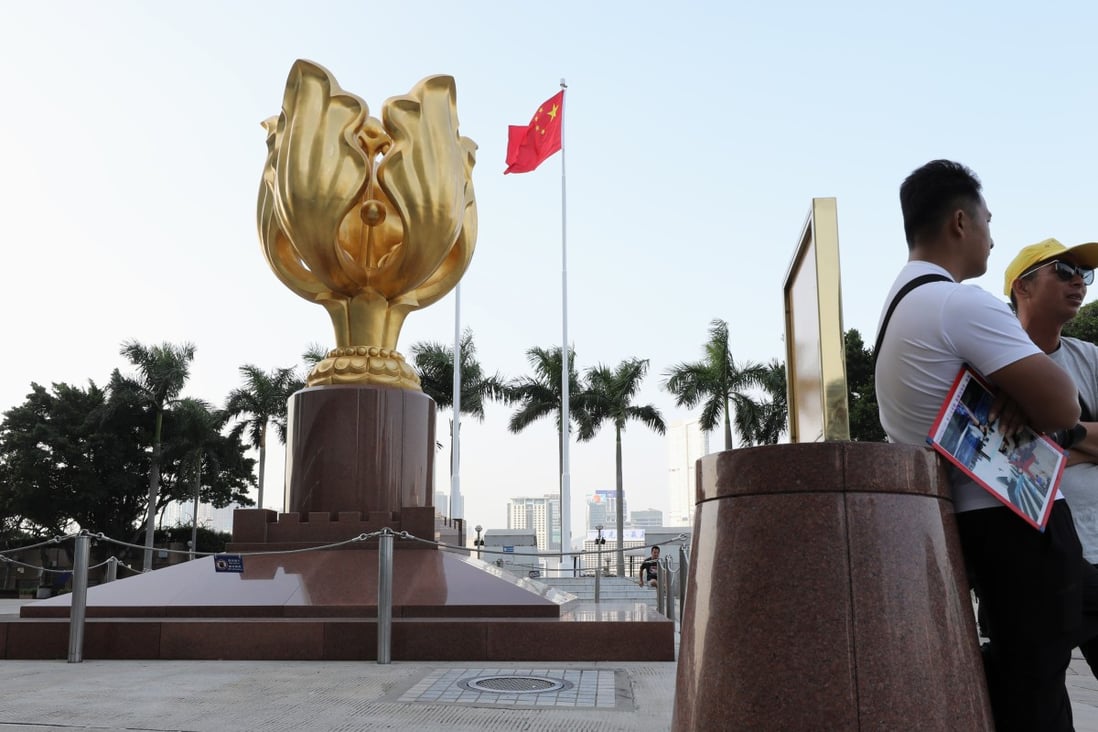 Mainland tourists at the Golden Bauhinia Square, Wan Chai. Photo: Dickson Lee