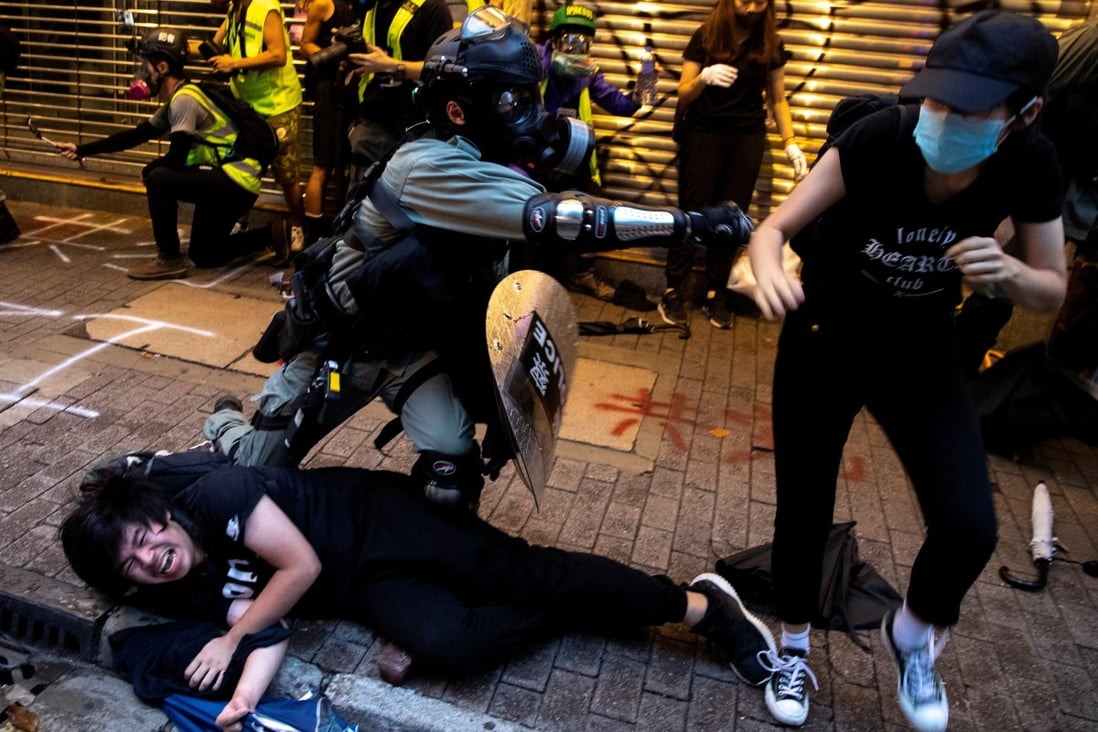 Hong Kong police clash with anti-government protesters during a demonstration in Causeway Bay on October 6. Photo: Reuters