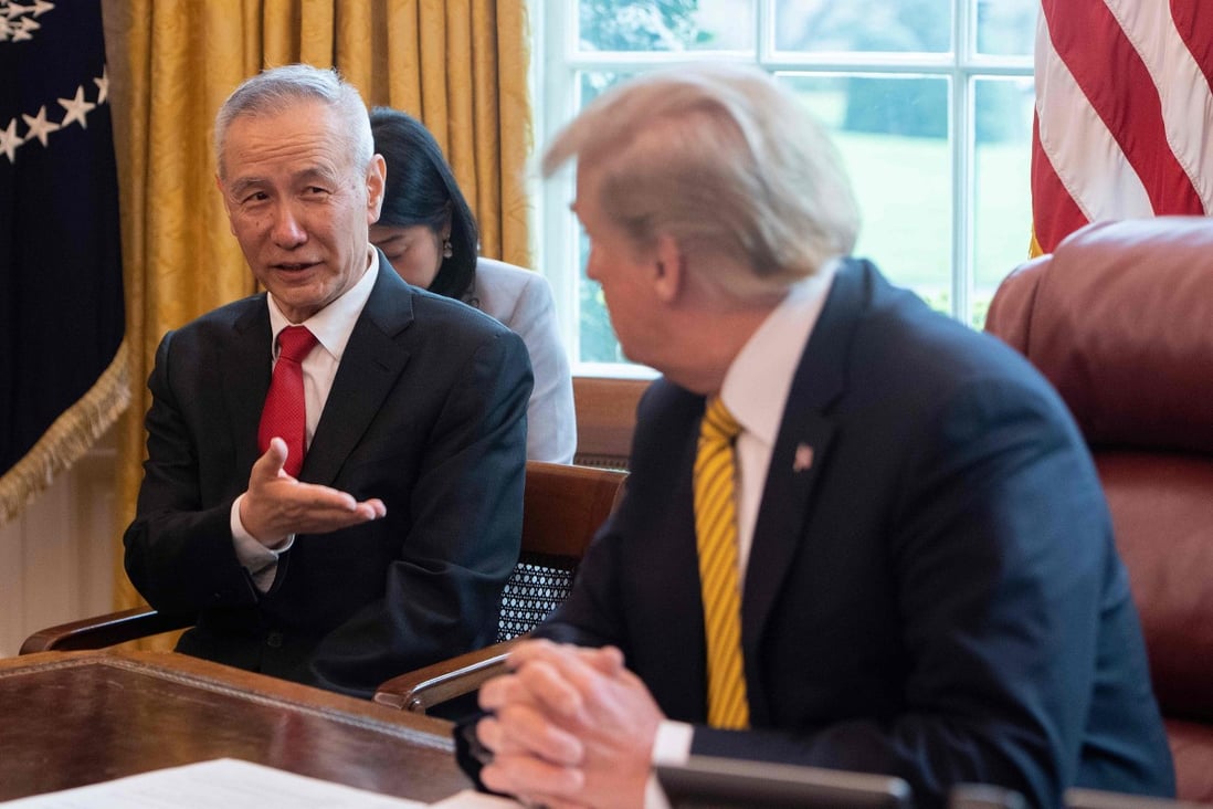 China's Vice-Premier Liu He speaks with US President Donald Trump during a trade meeting in Washington. Photo: AFP