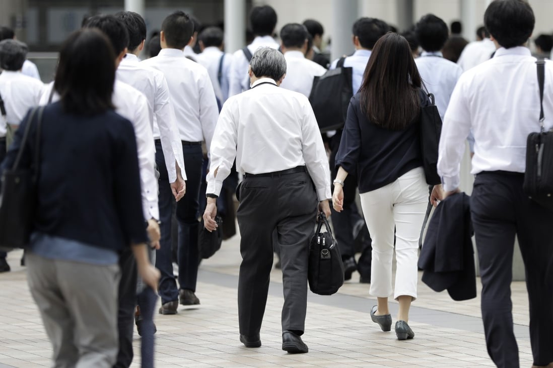 Japan’s government has introduced legislation to eliminate harassment at work. Photo: Bloomberg