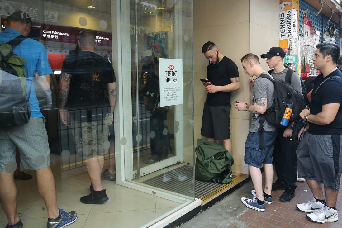 American servicemen and sailors from the USS Chafee lining up at the ATMs in Kennedy Town on 2 October 2017. Photo: Dickson Lee