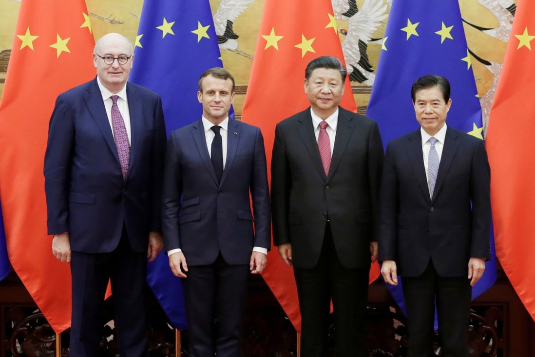 From left, EU trade commissioner-designate Phil Hogan, French President Emmanuel Macron, Chinese President Xi Jinping and Chinese Commerce Minister Zhong Shan mark a series of deals at the Great Hall of the People in Beijing. Photo: Reuters