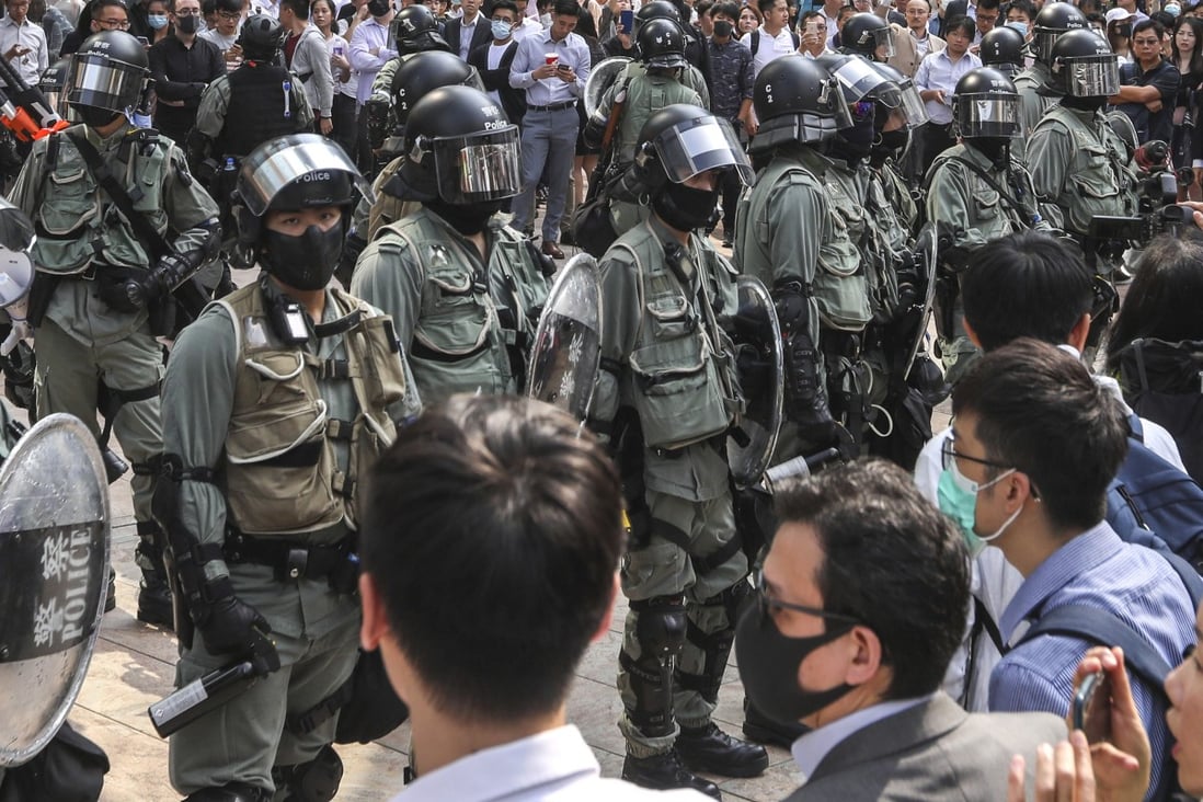 Riot police facing anti-government protesters in Central on Wednesday. Photo: Nora Tam
