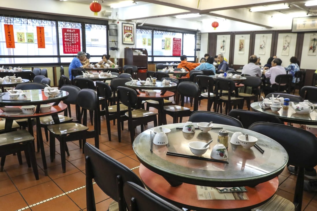 An empty restaurant in Sheung Wan earlier this month. Many Hong Kong businesses have struggled amid ongoing political unrest. Photo: Nora Tam