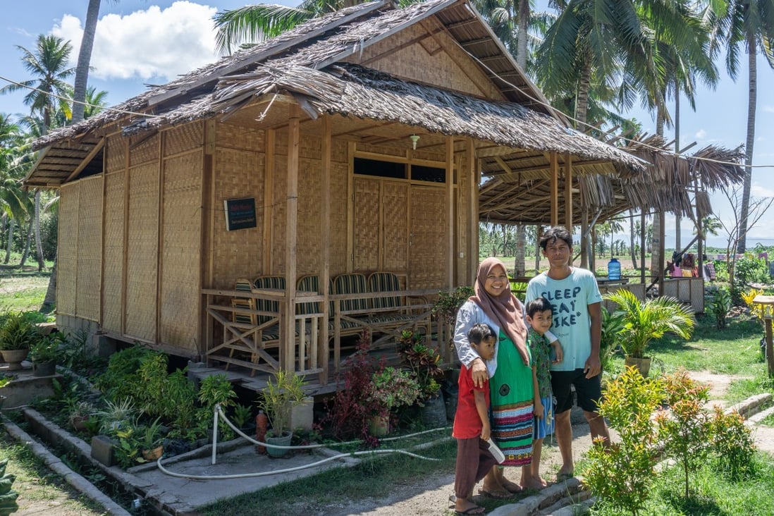 Harry Gobel (right), his wife Mimin and their children at their homestay in Gorontalo province, eastern Indonesia. Homestays have proved very popular in the country. Photo: Ian Morse