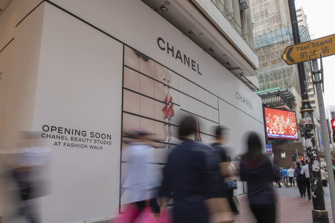 An as-yet-unopened Chanel shop on Fashion Walk in Causeway Bay. The hoarding has been up since August, with the shop’s opening delayed because of ongoing anti-government protests. Photo: Antony Dickson