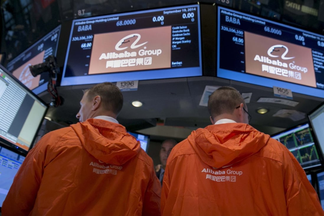 Specialist traders work at the post that trades Alibaba Group Holding during the company's initial public offering in New York Stock Exchange in 2014. Photo: Reuters