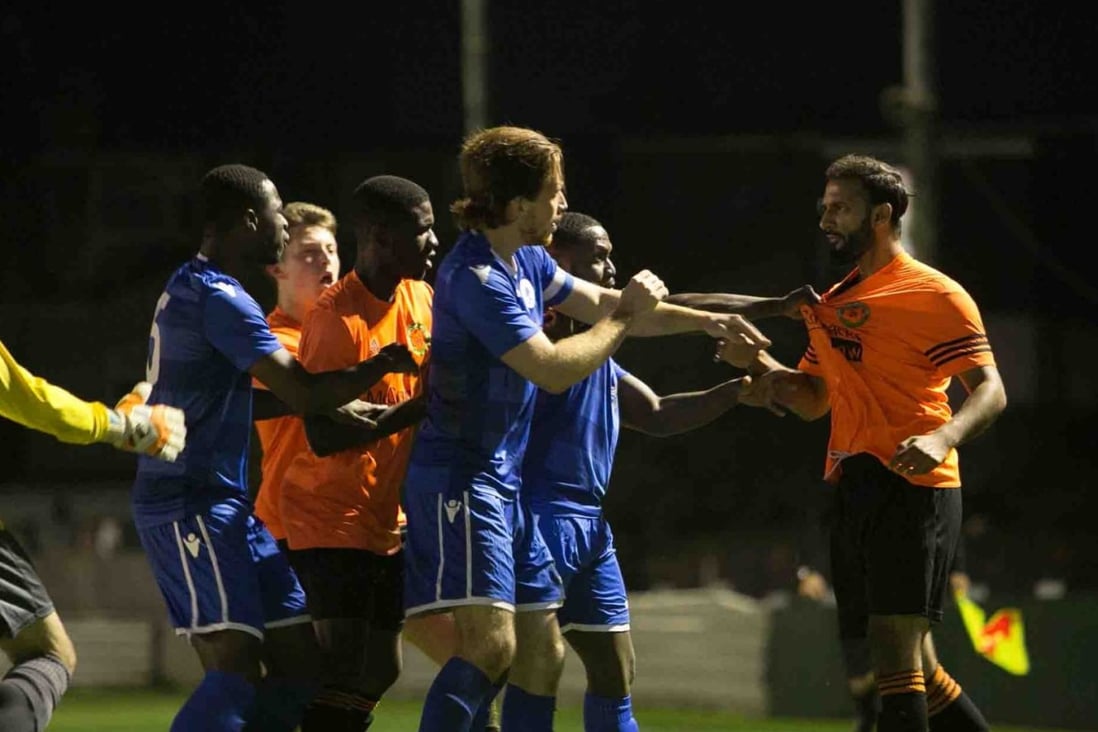 Players square up during a Sporting Bengal (orange shirts) game in the English lower leagues. Photo: Alan Zaman