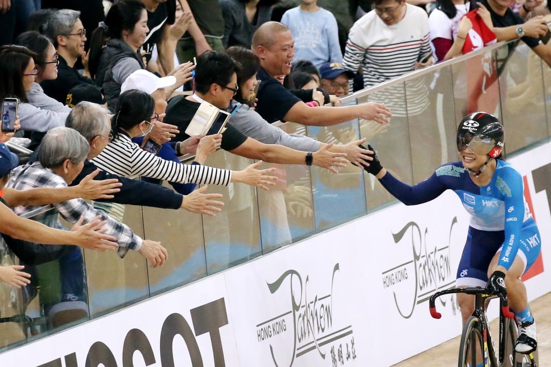 Sarah Lee high fives fans after winning the keiren at a World Cup leg at Tseung Kwan O velodrome in January. Photo: Felix Wong