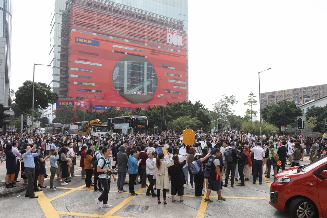 Protesters block the junction of Sheung Yuet Road and Wang Chiu Road near MegaBox shopping centre in Kowloon Bay. Photo: Nora Tam