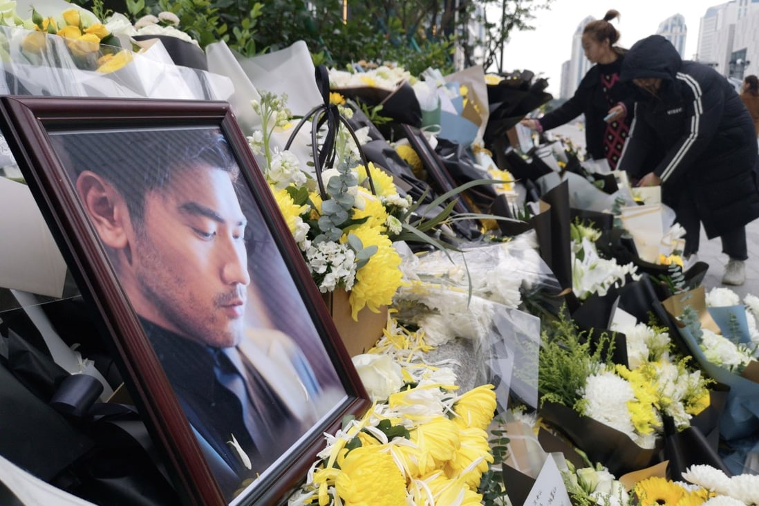 Fans lay floral tributes to Godfrey Gao in the east China city of Ningbo. Photo: DPA