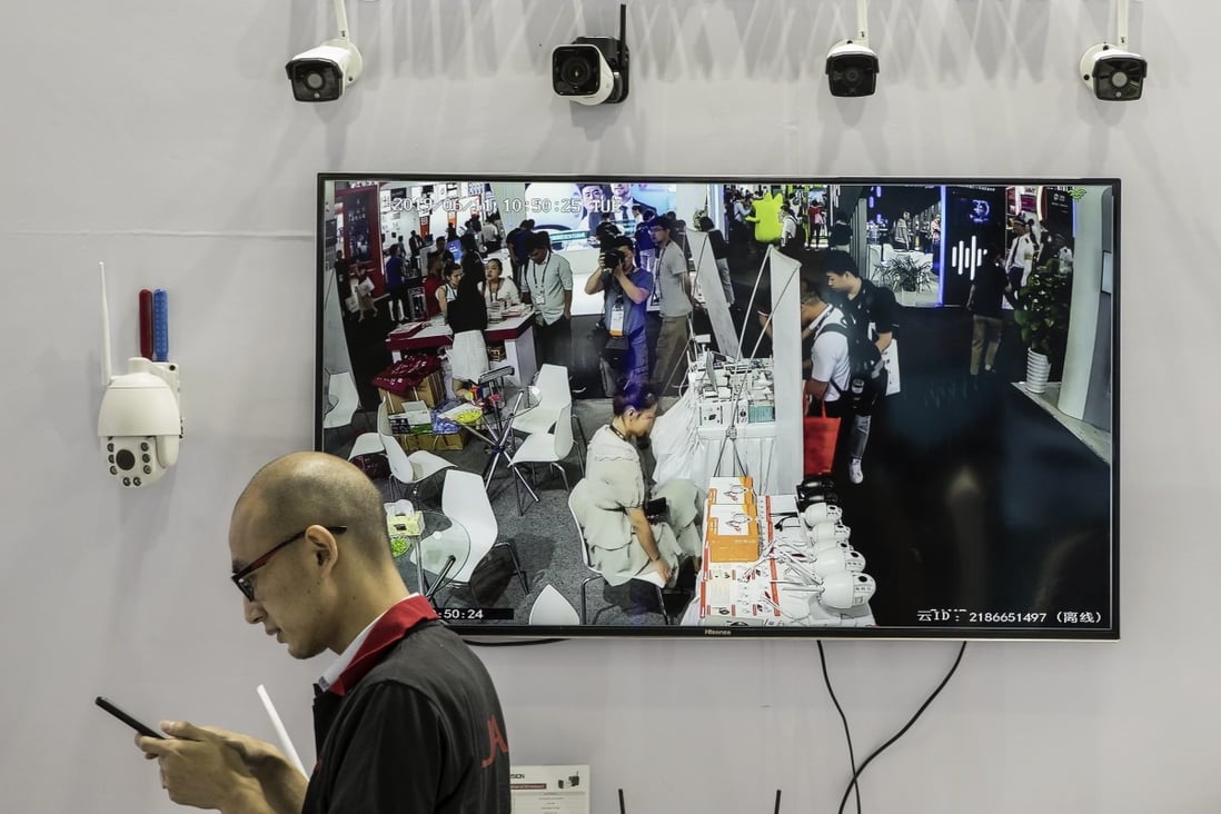 Surveillance cameras and a screen are displayed at a Guangzhou Juan Intelligent Tech Joint Stock Co. facial recognition display area during the CES Asia Show in Shanghai, June 11, 2019. Photo: Bloomberg