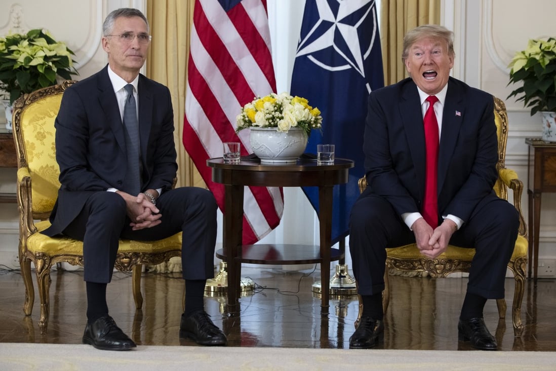 US President Donald Trump (right) met with Nato secretary general Jens Stoltenberg in London. Photo: AP