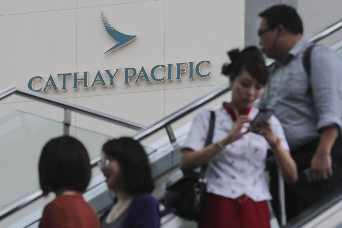 Cathay Pacific plans to fly fewer flights as demand for its flights wanes due to the impact of Hong Kong’s civil unrest. Photo: Edward Wong