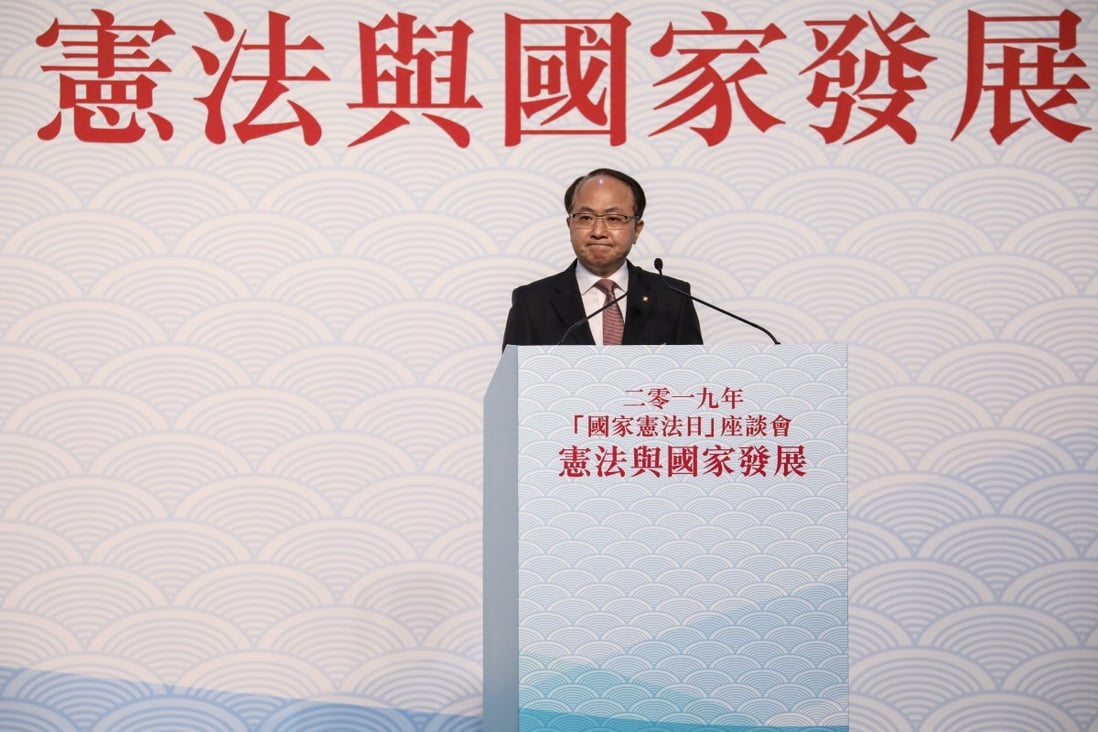 Wang Zhimin, director of the central government’s liaison office in Hong Kong, attends the 2019 National Constitution Day forum at the Hong Kong Convention and Exhibition Centre. Photo: K.Y. Cheng