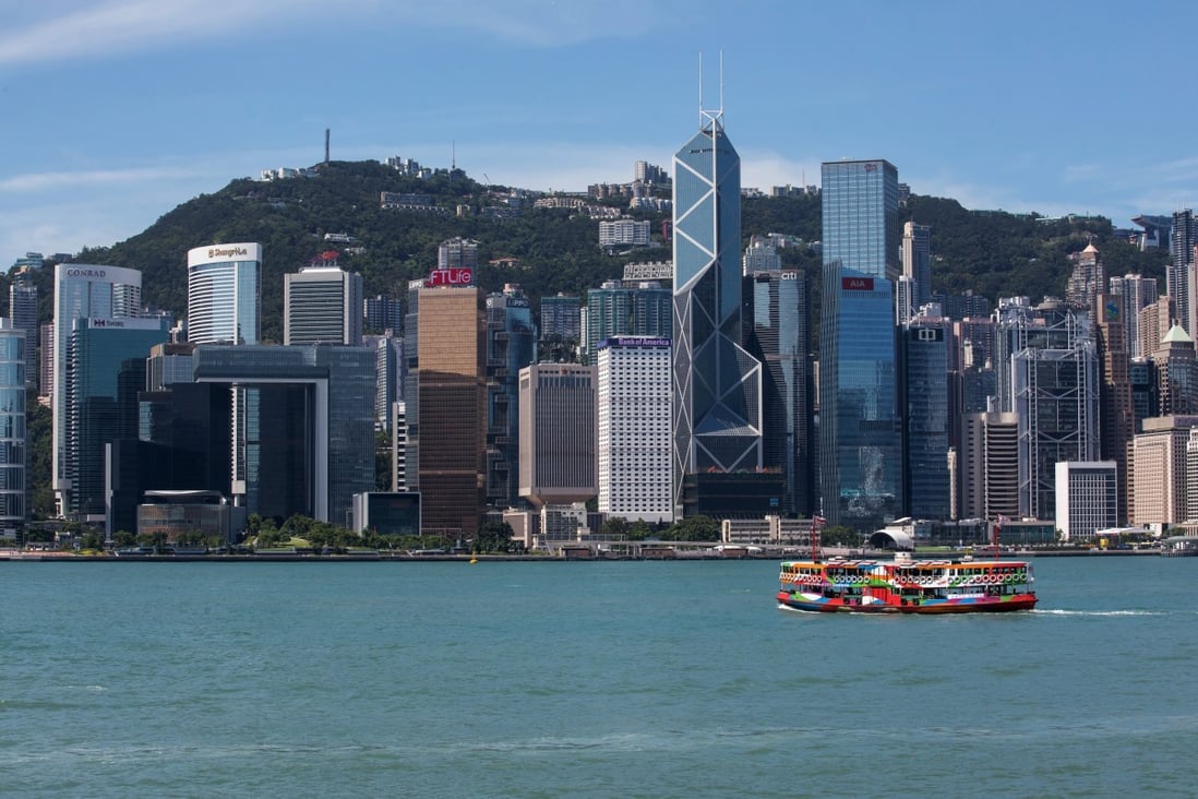 A Star Ferry sails across Victoria Harbour in Hong Kong, in August. Lonely Planet has included the iconic crossing in its coffee table book, Amazing Boat Journeys. Photo: Bloomberg