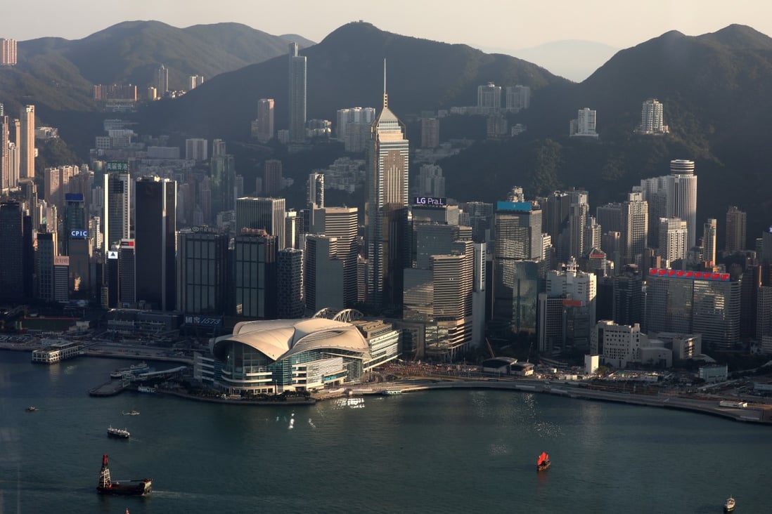 Hong Kong skyline and commercial buildings along the Wan Chai waterfront. Photo: Nora Tam