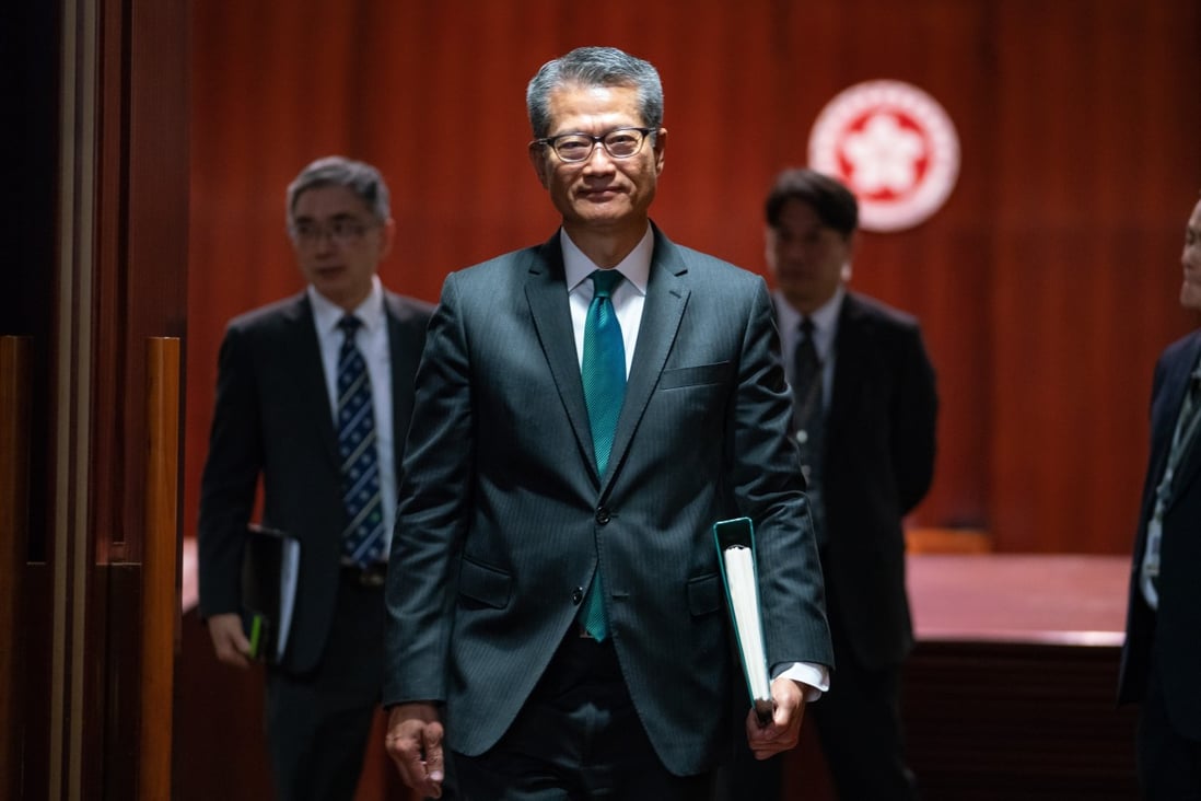 Financial secretary Paul Chan leaves the Legislative Council after delivering his budget speech on February 27. Since then, Chan has announced a series of measures to help businesses and sections of the society hard hit by six months of protests and the US-China trade war. Photo: Bloomberg