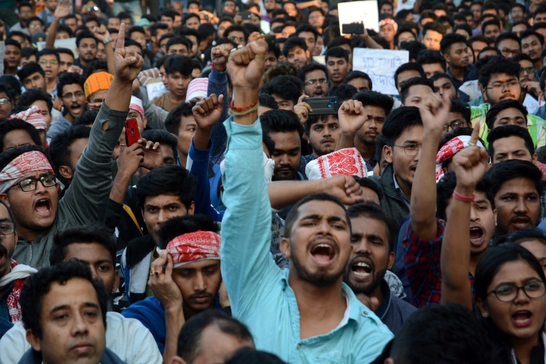 Students of Gauhati University shout slogans against the citizenship amendment bill, which was passed in the lower house. Photo: EPA-EFE