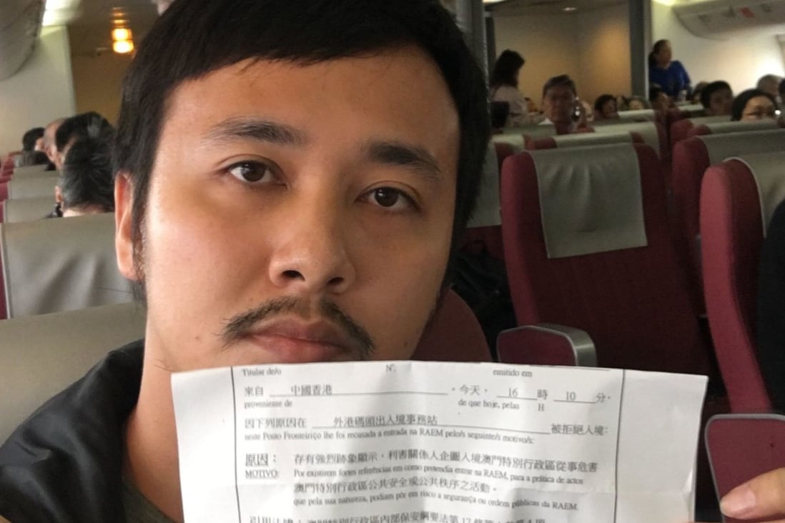 Reporter Phila Siu showing the written statement by officers, which alleged there were ‘strong signs’ he was trying to engage in activities that would ‘jeopardise the public safety and public order’ in Macau.